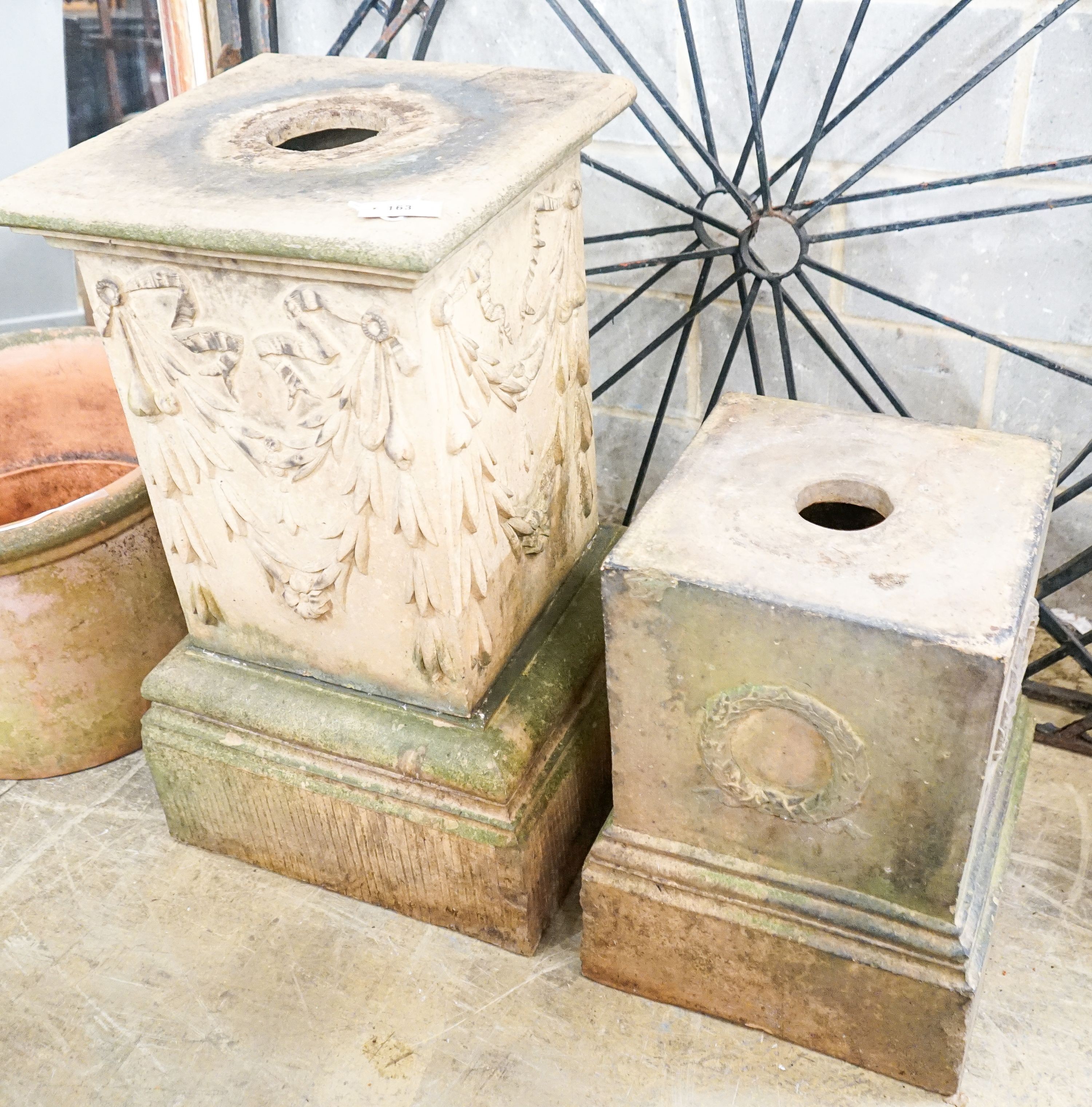 Two moulded terracotta garden pedestals, larger height 92cm